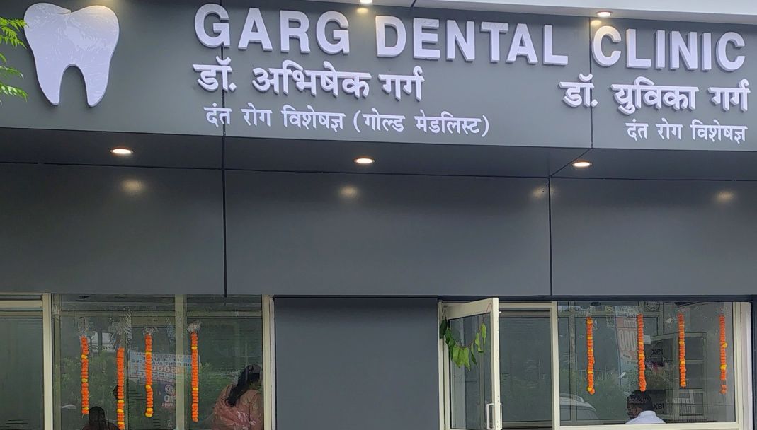 Garg Dental Clinic illuminated signboard, Muzaffarnagar